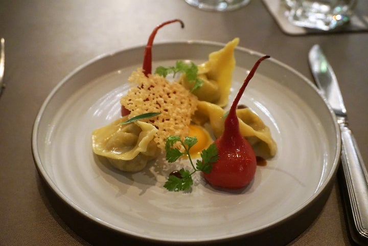 <p>Black Walnut Tortelloni, baby beets, fine herbs, saba </p>