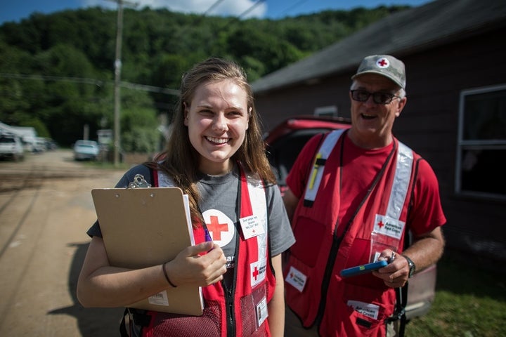 <p>American Red Cross millennial volunteer Angelle Henkelmann surveyed flood-damaged homes in Richwood, West Virginia, with fellow Red Cross worker Mike Petterson.</p>