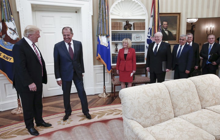 President Donald Trump and Russian Foreign Minister Sergey Lavrov (second from left) meet for talks in the Oval Office, along with Russian Ambassador Sergey Kislyak (fourth from right).