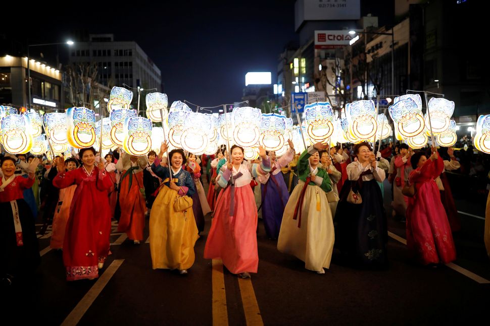 Buddhist believers carrying lanterns march during a Lotus Lantern parade in celebration of the upcoming birthday of Buddha in Seoul, South Korea April 29, 2017.