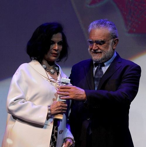 <p>Bianca Jagger receiving the Mayahuel Award from Ivan Trujillo at the Guadelajara International Film Festival</p>