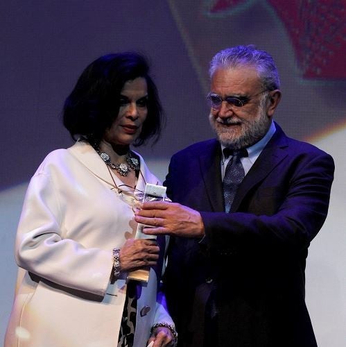 Bianca Jagger receiving the Mayahuel Award from Ivan Trujillo at the Guadelajara International Film Festival