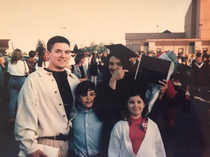 Donna Martino at her college graduation with her three kids, Angelo Jaret and Brianne.