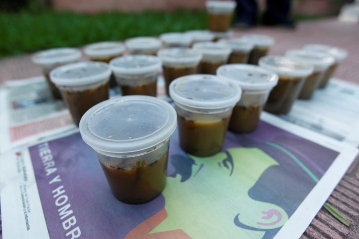 Plastic pots filled with feces, called "poopootovs," a play on Molotov cocktails, are seen before they are thrown at security forces during protests, in addition to the usual rocks and petrol bombs, in Caracas, Venezuela, May 9, 2017.