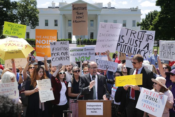 Democratic National Committee Chairman Tom Perez speaks Wednesday as people rally outside the White House to protest against President Donald Trump's firing of FBI Director James Comey.