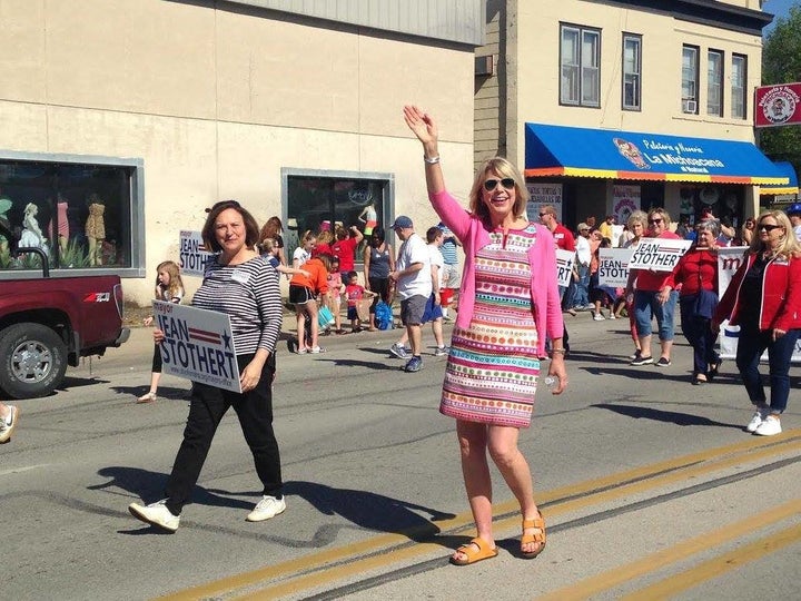 Jean Stothert, at right, marches in South Omaha's annual Cinco de Mayo parade. The city's Republican mayor has cast herself a