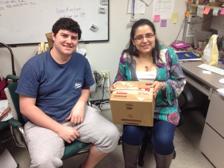 Adriana Hernandez, a Ph.D. student at Texas A&M, and Jacob Lancaster, a CPT technician, worked through the night to prepare phages to be shipped to San Diego.