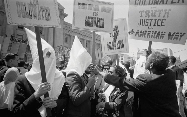 <p>KKK members support the Goldwater presidential bid at the 1964 RNC.</p>
