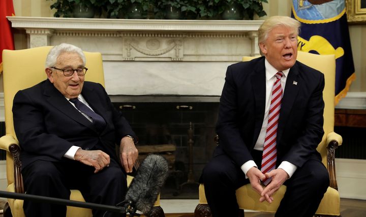 Kissinger and Trump chat with reporters yesterday.