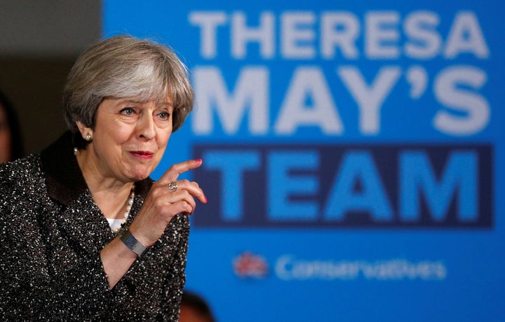 <strong>Theresa May said tuition fees would 'remain' under a Tory government </strong>