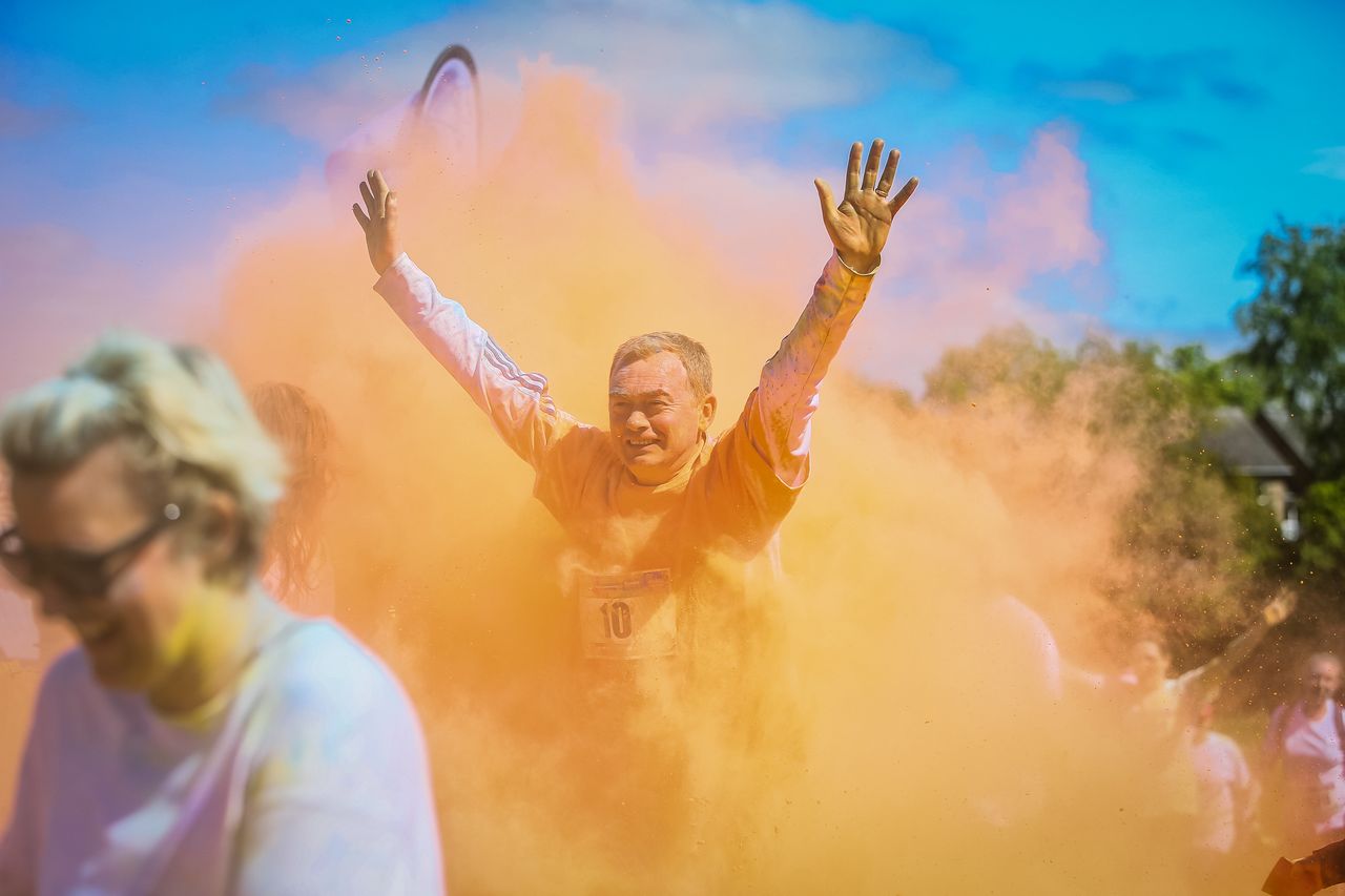 Tim Farron taking part in the Kendal Colour Dash to raise funds for St John Hospice