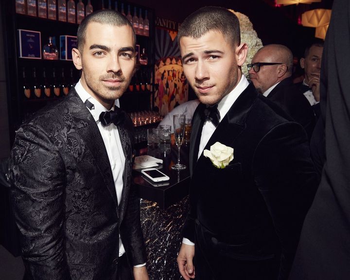 Joe and Nick Jonas look suave at the Vanity Fair party.
