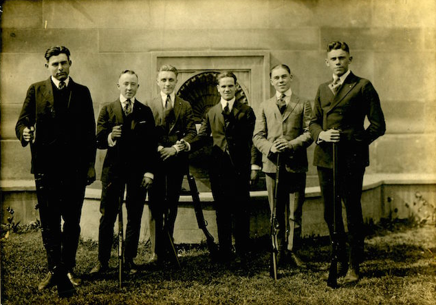 The teenage Hemingway, left, and his “Shotgun Club.”