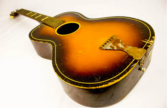 Paul Simon’s first guitar, Courtesy of Paul Simon Archive