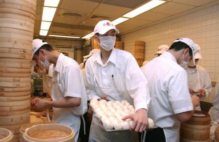 Chefs work in the kitchen at the restaurant's Taiwan location.