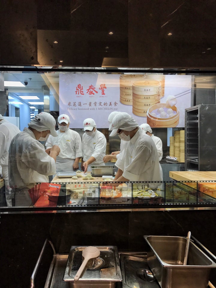 Chefs at work in the kitchen at Din Tai Fung's Miramar location in Hong Kong.