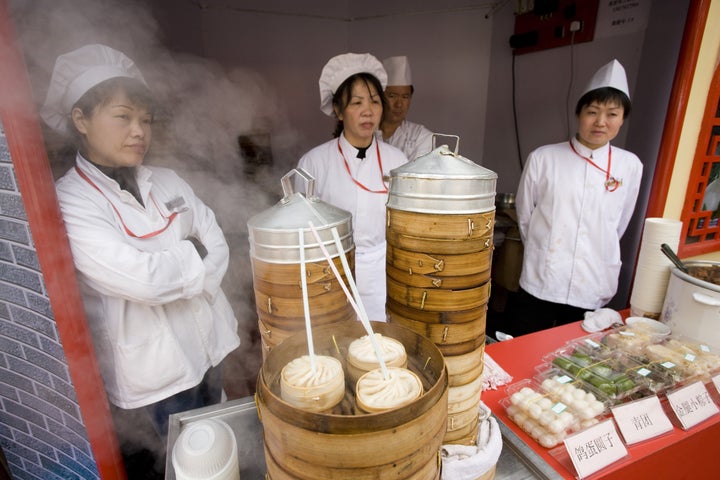 Soup dumplings stall in the Yu Garden Bazaar Market, Shanghai, China.