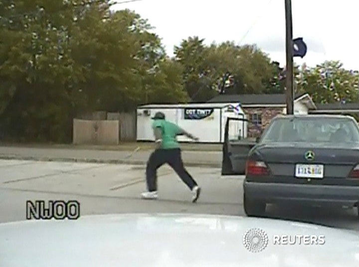 A still image taken from police dash cam video allegedly shows Walter Scott running from his vehicle during a traffic stop be