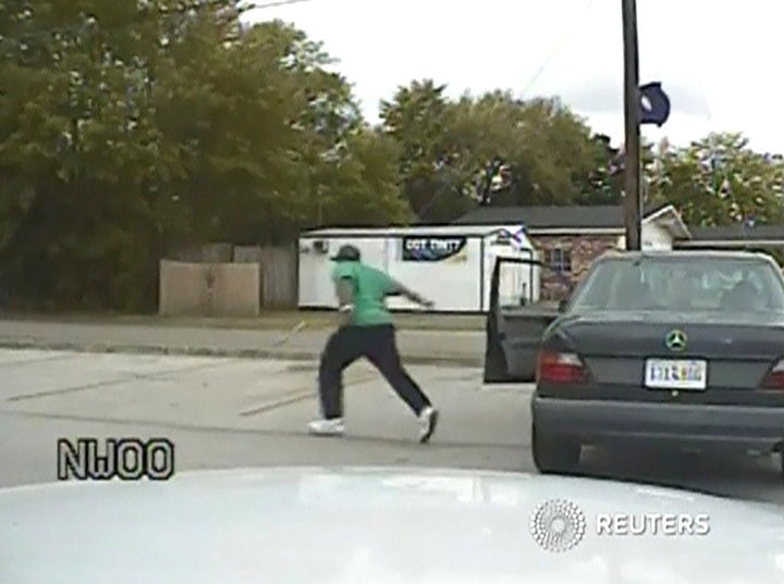 A still image taken from police dash cam video allegedly shows Walter Scott running from his vehicle during a traffic stop before he was shot and killed by white police officer Michael Slager in North Charleston, South Carolina. 