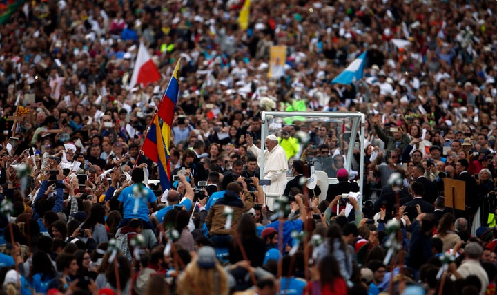 Pope Francis waves as he arrives at the Catholic shrine of Fatima, Portugal May 12, 2017.