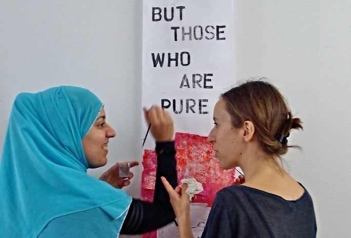 <p>Two participants working on <em>Blood, Milk and Tears </em></p>