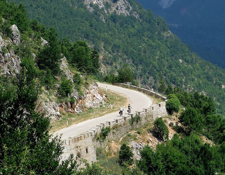 <p><em>Biking through Albania’s countryside</em></p>