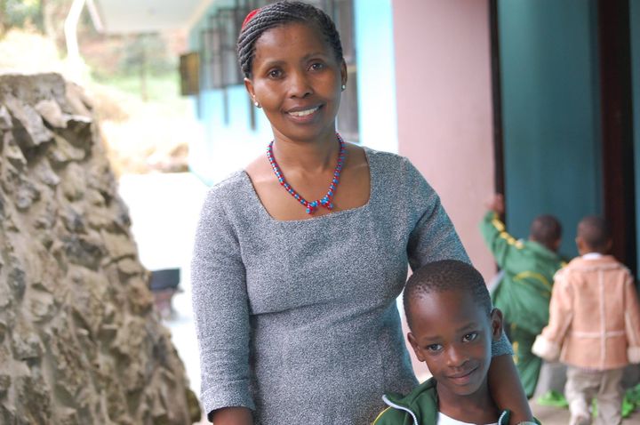 Kantate, who cared for Ester from birth at Nkoaranga Orphanage, visits her at Happy Family Children’s Village 