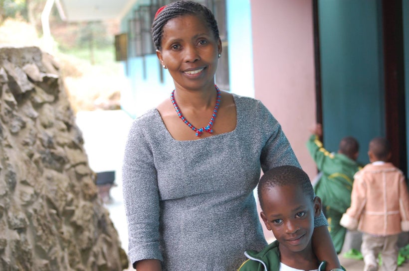 Kantate, who cared for Ester from birth at Nkoaranga Orphanage, visits her at Happy Family Children’s Village