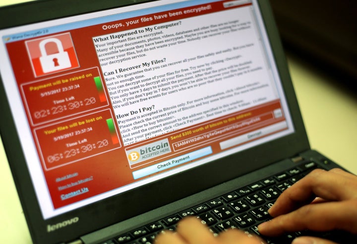A programer shows a sample of a ransomware cyberattack on a laptop in Taipei, Taiwan, 13 May, 2017. According to news reports