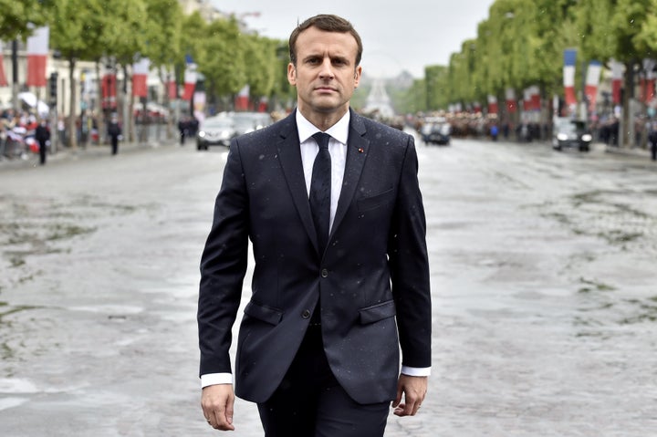 French President Emmanuel Macron arrives to attend a ceremony at the Tomb of the Unknown Soldier at the Arc de Triomphe in Pa