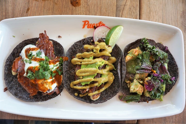 <p>Puesto Tacos</p><p>L to R: Chicken Al Pastor, Beef Tenderloin, Grilled Market Fish (Salmon).</p>