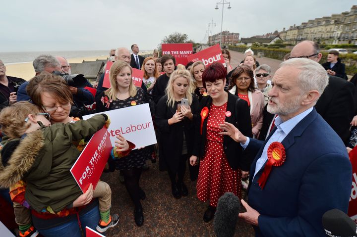 Jeremy Corbyn with Labour candidate Sonia Barker (second right) and local people on the beach at a campaign event in Lowestoft.