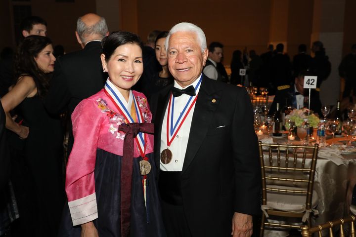 Yumi Hogan is an accomplished artist and the First Lady of Maryland pictured here with Nasser Kazeminy, the Chairman of NECO. 