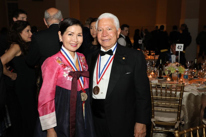 Yumi Hogan is an accomplished artist and the First Lady of Maryland pictured here with Nasser Kazeminy, the Chairman of NECO.
