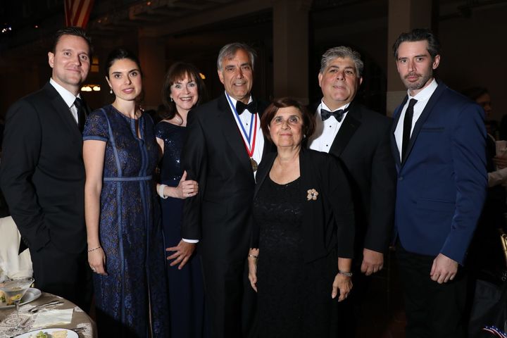 2017 Honoree Harris Pastides, President of University of South Carolina (shown with medal) and his extended family on Ellis Island. 