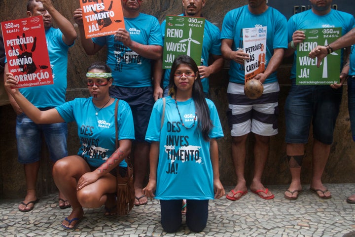 <p>Indigenous peoples, fishermen and representatives of social movements protest outside the headquarters of the National Agency for Oil and Gas, in Rio de Janeiro.</p>