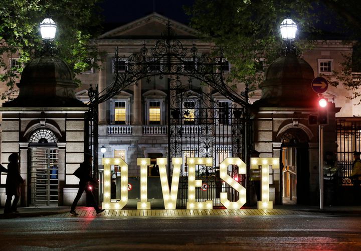 <p>Outside the Irish Parliament building as part of a campaign urging the Irish Government to divest from fossil fuels. </p>