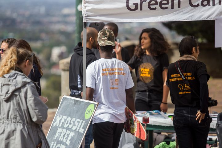 <p>University of Cape Town (UCT) students collect signatures for a petition calling for the University to divest. </p>