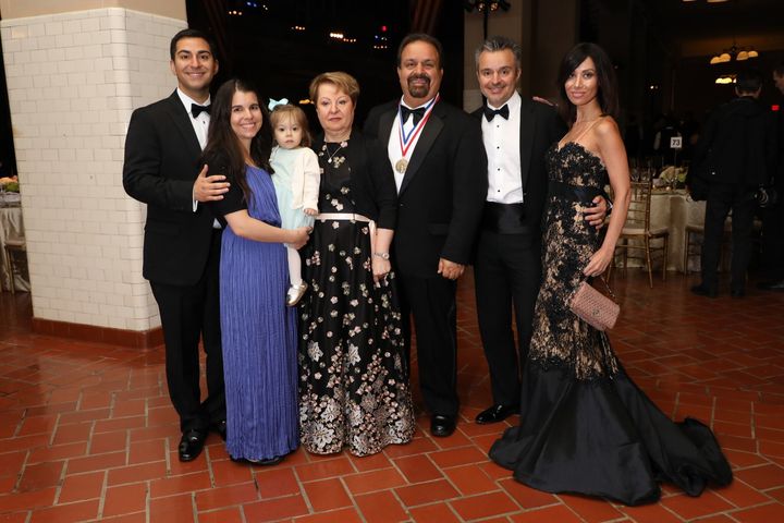 2017 Medalist Mohammad Farzaneh and his family at Ellis Island. 