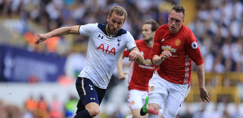 Spurs striker Harry Kane battles with Manchester United centre-back Phil Jones at White Hart Lane on Sunday 14 May.