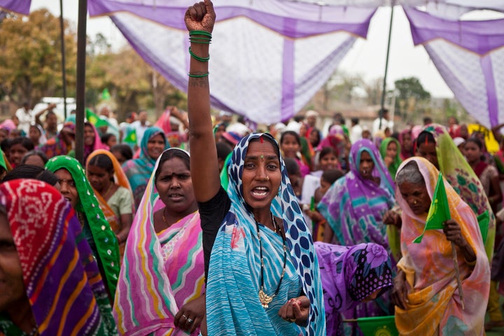 Villagers in India’s Singrauli region celebrate stopping a coal mine project. Insurers play an essential role in the global c
