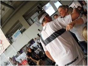<em>Kim Russell-Waselenchuk congratulates her husband.</em>