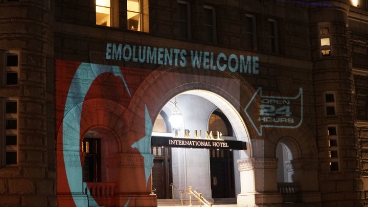 The artist's projections on the hotel cycled through three messages.