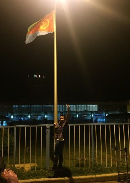 Nguyen hugs country 198’s flagpole, clearing customs just after 4:00 am.