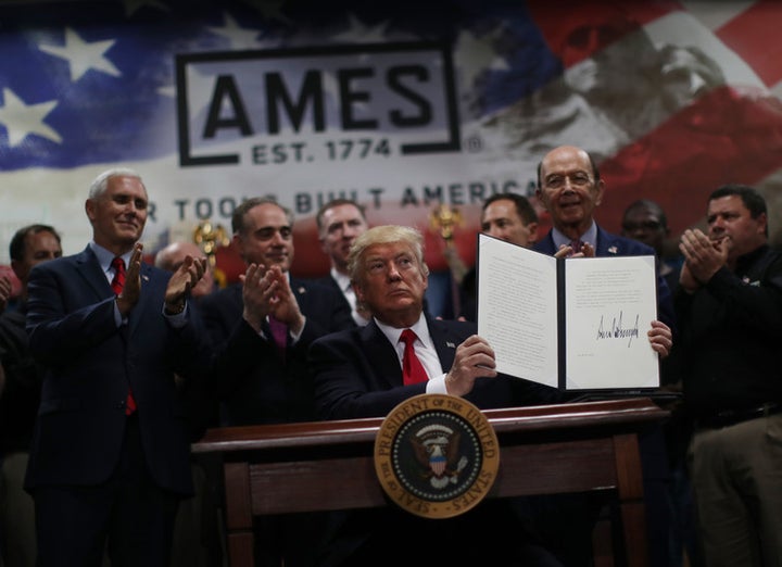 Trump signs an executive order to establish an office of trade and manufacturing policy as part of his campaign to revamp US