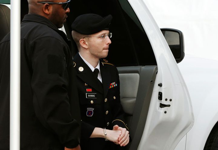 Bradley Manning is escorted into court to be sentenced