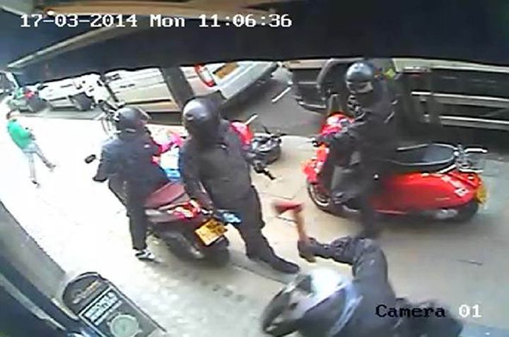 CCTV footage issued by Metropolitan Police of armed robbers who tried to smash their way into Watches of Switzerland in New Bond Street, London, using a moped, a sledgehammer and an axe