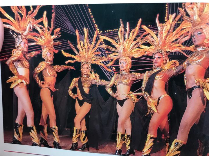 <p>Elaborate costumes on the showgirls</p>