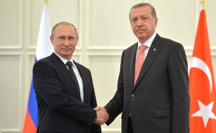 Russian president Vladimir Putin and Erdoğan during a meeting in Baku, 13 June 2015 .