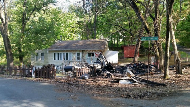A photo of the home taken by police after the arson fire.